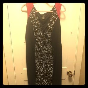 Black and white polka dot dress with pink sleeves